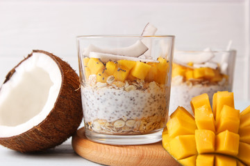 chia pudding with mango, coconut and granola. Proper nutrition, superfood. Healthy breakfast,...