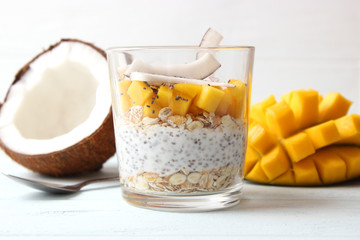 chia pudding with mango, coconut and granola. Proper nutrition, superfood. Healthy breakfast, dessert.