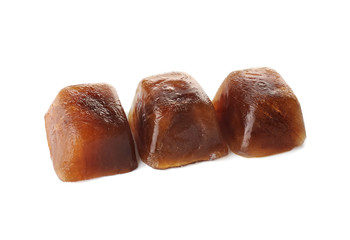 Coffee ice cubes on white background