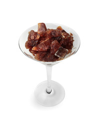 Glass with crushed coffee ice on white background