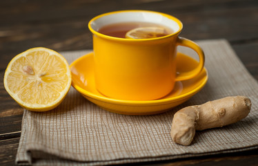 lemon ginger tea on wooden table