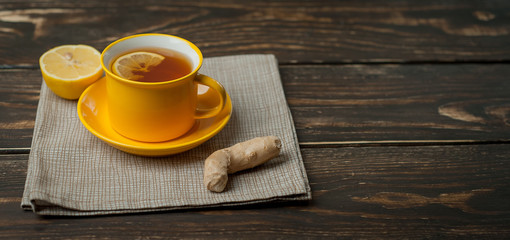 lemon ginger tea on wooden table