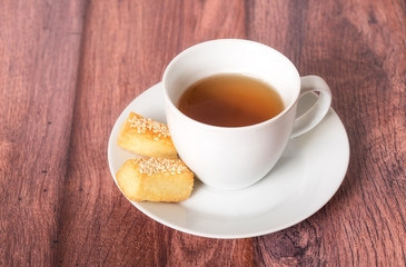 Cup of tea with cakes