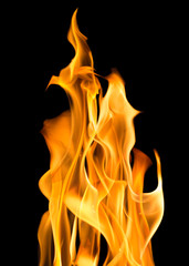 orange sparks of bright flames on black