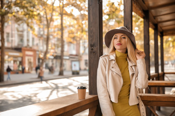 Fototapeta premium Beautiful fashionable woman outdoors