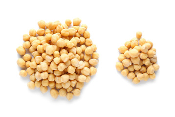 Heaps of chickpeas on white background