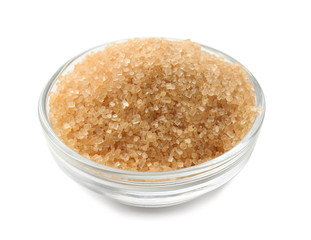 Granulated brown sugar in bowl on white background