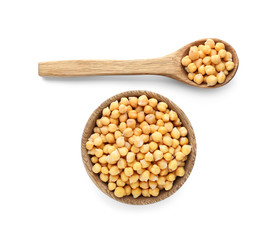 Bowl and spoon with chickpeas on white background