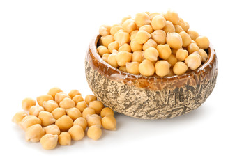 Bowl with chickpeas on white background