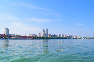 Fototapeta premium View across the river at home in the city.