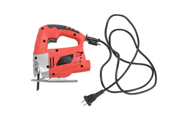 Fototapeta premium Electric jig saw with electric wire and plug isolated on white