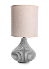 Stylish table lamp on white background