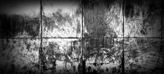 Old tiled wall of an industrial building interior