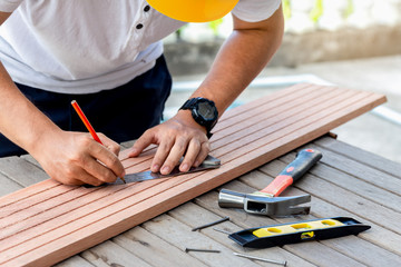 Carpenter man measuring