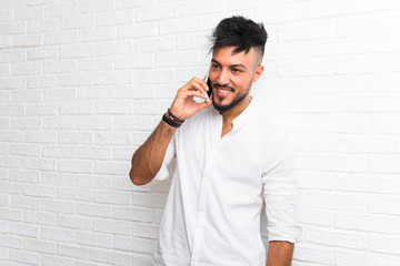 Arabic young man using mobile phone