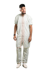 Fototapeta premium A full-length shot of a Arabic young man wearing typical arab clothes having doubts and with confuse face expression on isolated white background