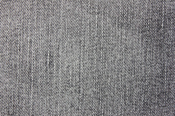 Fototapeta na wymiar Dark Gray Jeans Texture Empty Background. Denim Pattern of Grey Jean Fabric, Textured Stylish Surface Close Up Top View. Rough Grungy Urban Clothing Detail to Use as Backdrop or Copy Space