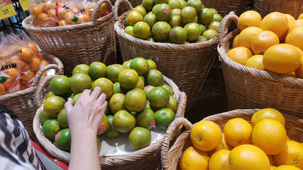 Orange in the basket in the supermakat, Bangkok, Thailand,  December 3 2018.