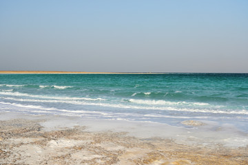 Dead Sea seashore in the evening in cloudy weather