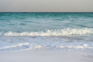 Dead Sea seashore in the evening in cloudy weather