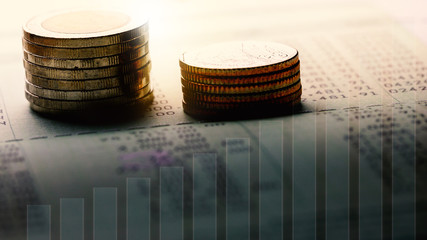 Stack of coins on account book