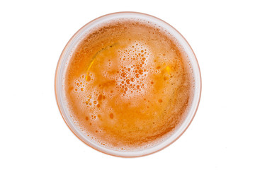 Beer in glass. Beer foam isolated on white background. View from above.