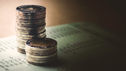 Coins on account book