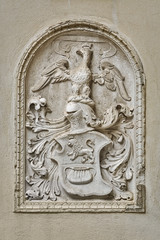 Fototapeta na wymiar Bas-relief in the Form of a Coat of Arms