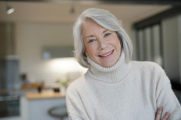 Senior woman looking happy at home