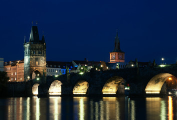 City landscape, Prague, Czech Republic. Buildings and structures over the river in the evening, summer. Ancient European city