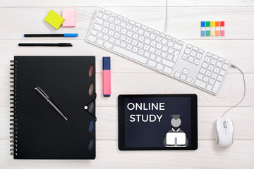Online Study e-learning concept. Flat lay  wooden desk Nordic style. Online education