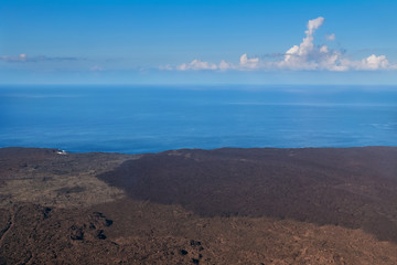 Aerial View of where lava meets the sea along the Southwest Coast of Hawaii's Big Island