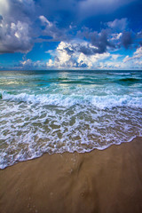 Waves and clouds at the beach