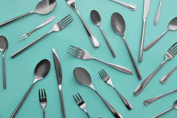 Set of cutlery on color background, flat lay - obrazy, fototapety, plakaty