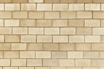 Old beige stone wall background texture