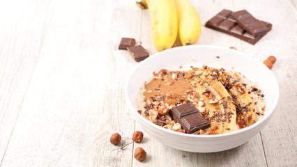 porridge with banana, nuts and chocolate