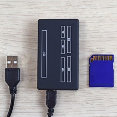 Card reader and flash drive.A device for transferring information from a flash drive to a computer.