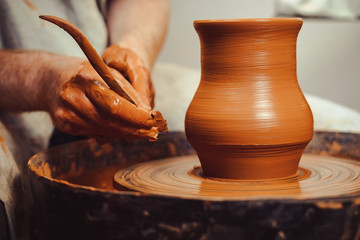 Potter makes a jug