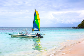 Little sail boats on a caribbean beach
