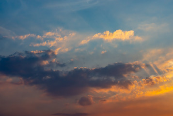 Fototapeta premium Sky and clouds reflected sunset light.