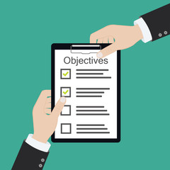 In hand. Objective board goal check list