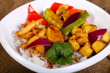 Wok with rice, cheese and tofu