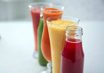 Glassware of tasty smoothies, closeup