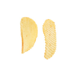 Tasty crispy potato chips on white background