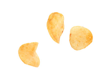 Tasty crispy potato chips on white background