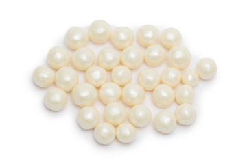 Multi-colored pearls on a white background
