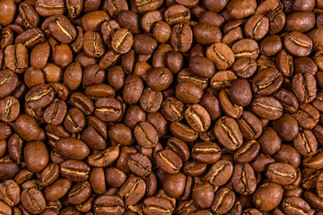 Background of many roasted coffee beans
