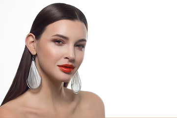Sexual full lips. Natural gloss of lips and woman's skin. The mouth is closed. Increase in lips, cosmetology. Orange lips and long neck. Great summer mood