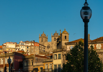Fototapeta premium view of the city of porto at golden hour