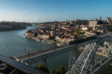 view of the city of potyo during the day with his bridge dom luis